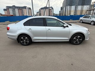 2015 Volkswagen Jetta VI Рестайлинг, серебристый, 1099000 рублей, вид 4