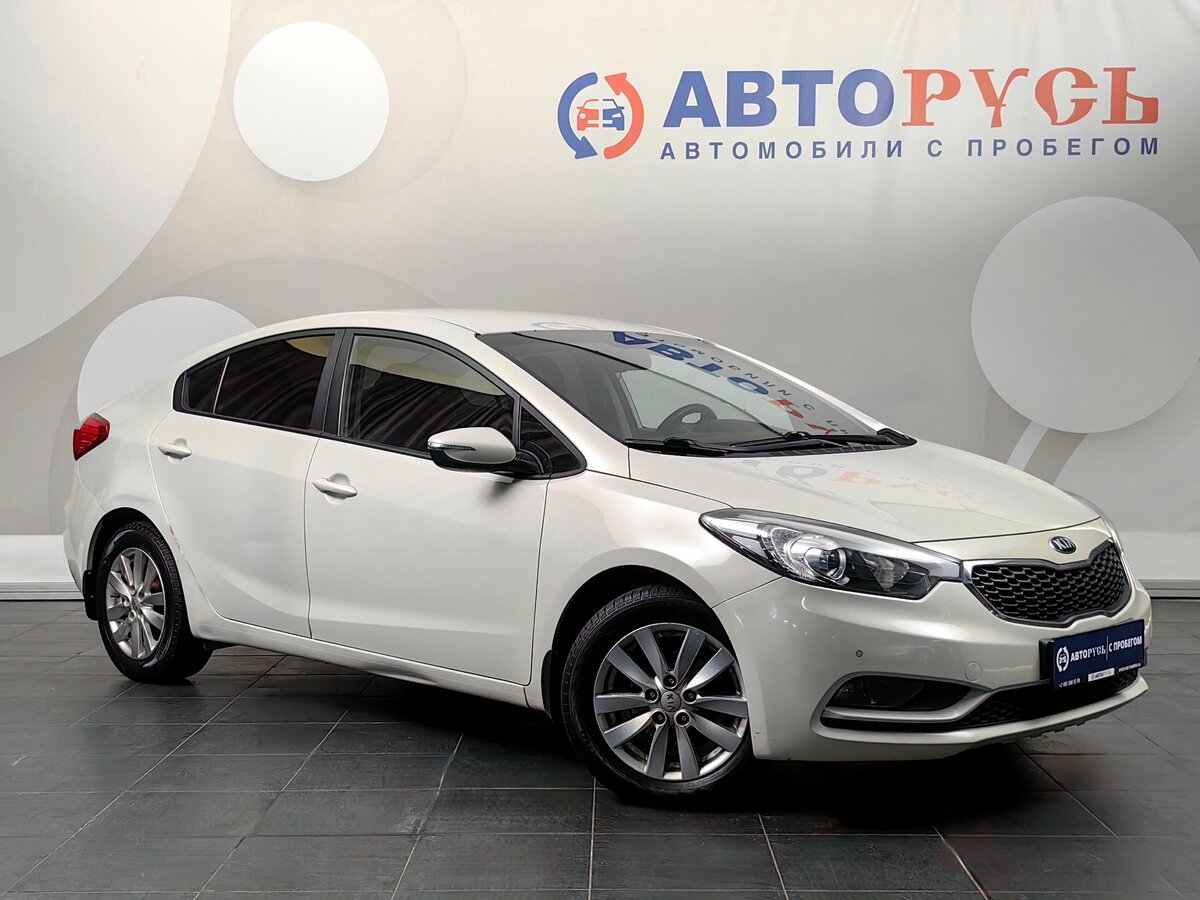 Открыть фотографии: Kia Cerato III