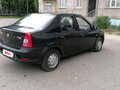 2012 Renault Logan I Рестайлинг, чёрный, 400000 рублей - вид 2