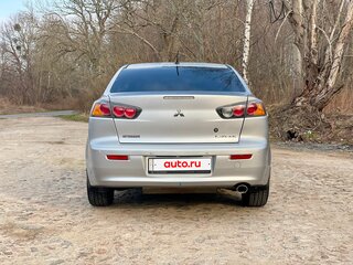 2011 Mitsubishi Lancer X Рестайлинг, серебристый, 805000 рублей, вид 5