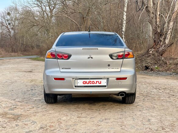 2011 Mitsubishi Lancer X Рестайлинг, серебристый, 805000 рублей - вид 4