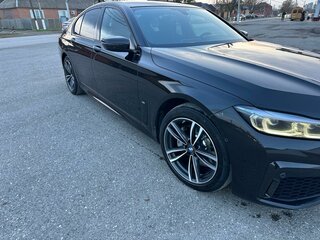 2019 BMW 7 серии 730d xDrive VI (G11/G12) Рестайлинг, чёрный, 4200000 рублей, вид 2