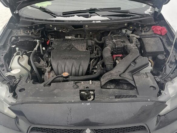 2007 Mitsubishi Lancer X, чёрный, 700000 рублей - вид 5