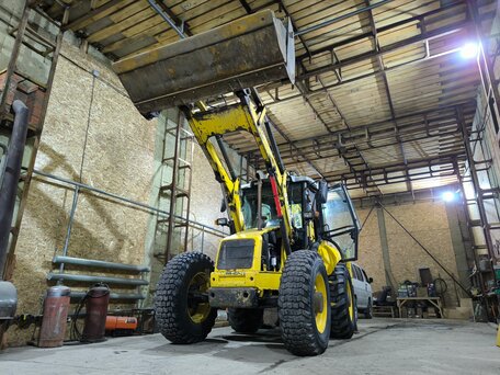 2005 New Holland LB115, золотистый, 5150000 рублей, вид 1