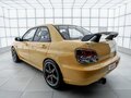 2004 Subaru Impreza WRX STi II Рестайлинг 1, жёлтый - вид 3