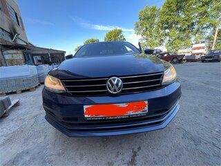 2016 Volkswagen Jetta VI Рестайлинг, синий, 1400000 рублей, вид 2