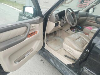 2004 Toyota Land Cruiser 100 Series Рестайлинг 1, чёрный, 2000000 рублей, вид 3
