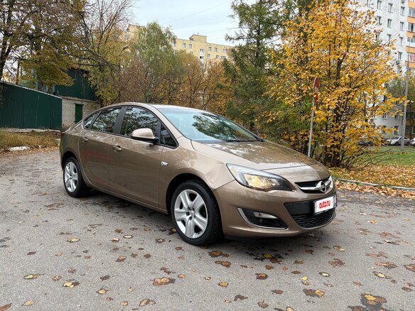 2012 Opel Astra J Рестайлинг, коричневый, 1150000 рублей - вид 2
