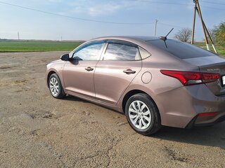 2019 Hyundai Solaris II, коричневый, 1390000 рублей, вид 2
