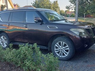2011 Nissan Patrol VI (Y62), пурпурный, 1750000 рублей, вид 3