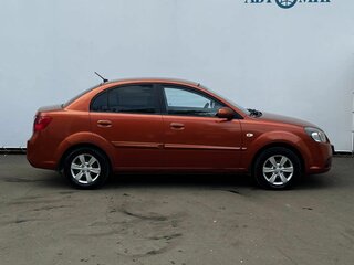 2010 Kia Rio II Рестайлинг, оранжевый, 409000 рублей, вид 4