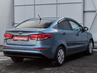 2015 Kia Rio 6-speed III, голубой, 860000 рублей, вид 4
