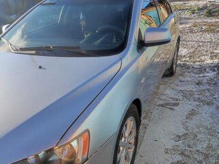 2011 Mitsubishi Lancer X Рестайлинг, серебристый, 570000 рублей, вид 1