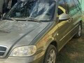 2005 Kia Carnival I Рестайлинг, зелёный, 850000 рублей