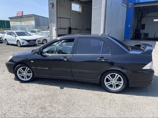 2006 Mitsubishi Lancer IX Рестайлинг, чёрный, 450000 рублей, вид 2
