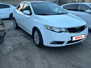 2009 Kia Cerato 5-speed II, белый, 550000 рублей, вид 2