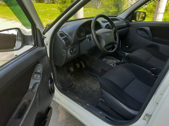 2012 Lada (ВАЗ) Kalina I, белый, 155000 рублей - вид 12