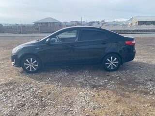 2013 Kia Rio 4-speed III, чёрный, 730000 рублей, вид 4
