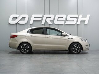 2013 Kia Rio 5-speed III, бежевый, 664000 рублей, вид 5