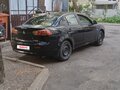 2008 Mitsubishi Lancer X, чёрный, 440000 рублей - вид 1