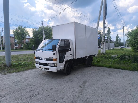1991 Isuzu Elf (N-series), белый, 465000 рублей - вид 32