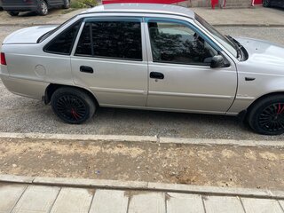 2010 Daewoo Nexia I Рестайлинг, серебристый, 200000 рублей, вид 2