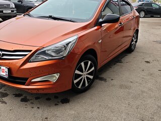 2014 Hyundai Solaris I Рестайлинг, оранжевый, 670000 рублей, вид 5