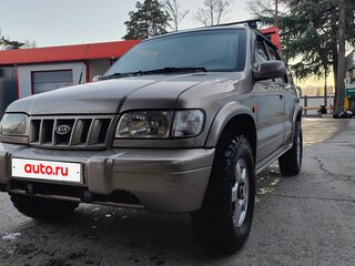 2004 Kia Sportage Grand I, коричневый, 530000 рублей, вид 1