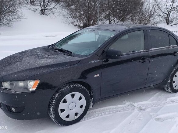 2007 Mitsubishi Lancer X, чёрный, 700000 рублей - вид 7