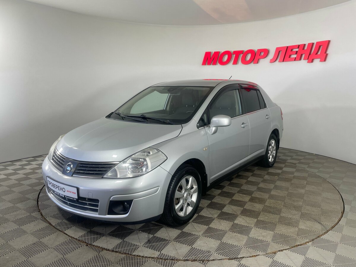 Открыть фотографии: Nissan Tiida I