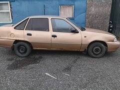2002 Daewoo Nexia I, бежевый, 145000 рублей, вид 3