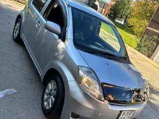 2009 Toyota Passo I (C10), серебристый, 320000 рублей, вид 2