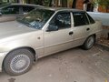 2012 Daewoo Nexia I Рестайлинг, бежевый - вид 2