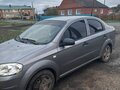 2010 Chevrolet Aveo I Рестайлинг, серый, 380000 рублей - вид 2