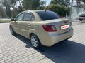 2010 Kia Rio II Рестайлинг, бежевый, 600000 рублей - вид 2