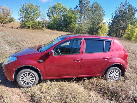 2011 Renault Sandero I, красный, 470000 рублей - вид 6