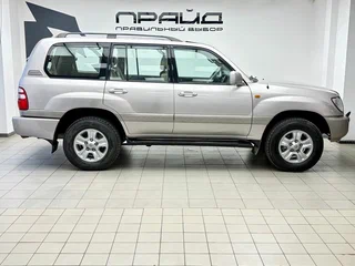 2003 Toyota Land Cruiser 100 Series Рестайлинг 1, серый, 1869900 рублей, вид 3
