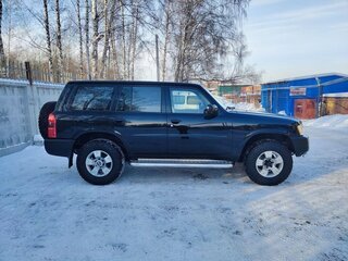 2011 Nissan Patrol V (Y61) Рестайлинг, чёрный, 3500000 рублей, вид 3