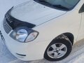 2002 Toyota Corolla IX (E120, E130), белый, 500000 рублей - вид 2