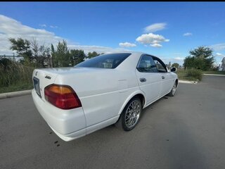 1997 Nissan Laurel VIII (C35), белый, 595000 рублей, вид 2