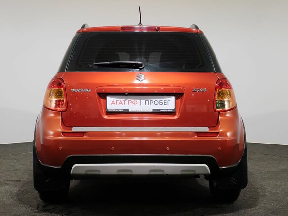 2010 Suzuki SX4 I (Classic) Рестайлинг, оранжевый, 750000 рублей - вид 5