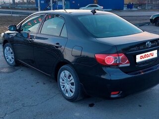 2010 Toyota Corolla X (E140, E150) Рестайлинг, чёрный, 1300000 рублей, вид 2