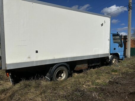 2009 Isuzu Elf (N-series), синий, 1200000 рублей, вид 2