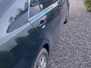 2010 Toyota Camry VI (XV40) Рестайлинг, чёрный, 900000 рублей, вид 2