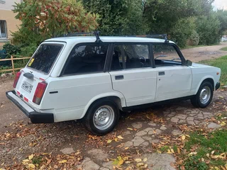 2003 Lada (ВАЗ) 2104 4-speed, белый, 130000 рублей, вид 5