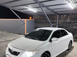 2009 Toyota Corolla X (E140, E150), белый, 780000 рублей, вид 2