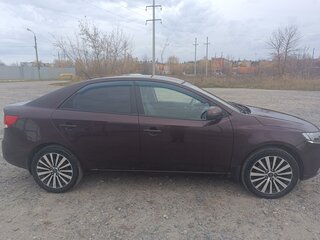 2011 Kia Cerato 6-speed II, пурпурный, 650000 рублей, вид 2