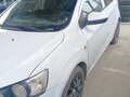 2015 Chevrolet Aveo II, белый, 650000 рублей