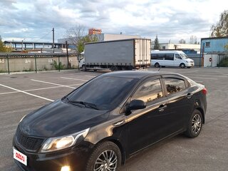 2012 Kia Rio 5-speed III, чёрный, 730000 рублей, вид 1