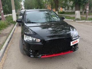 2010 Mitsubishi Lancer X, чёрный, 899000 рублей, вид 2